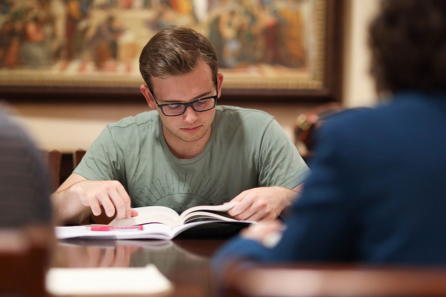 Student studying in library